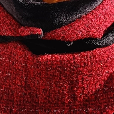 Detalle de la textura tweed Chanel rojo con interior de coralina negra [variant: Negro]